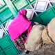 Ardo Omaar, a trader, inspects the sacks full of khat.